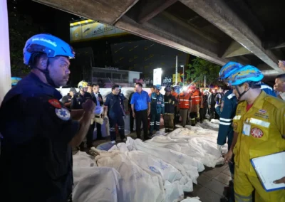 Bangkok bar fire kills 27 as dozens remain missing